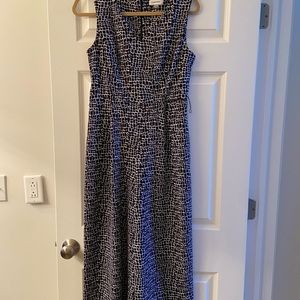 Gently loved size 6 Calvin Klein jumpsuit. Black and white giraffe print